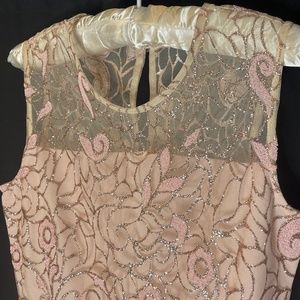 Rare Editions girl’s gold and pink wedding dress.